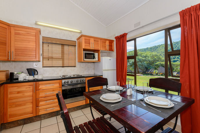 Imagen de la habitación del Hotel Hazyview Cabanas. Foto 8