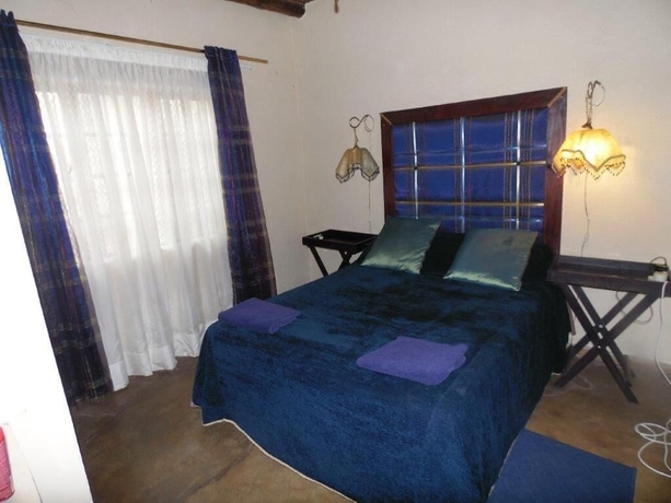 Imagen de la habitación del Hotel Hazyview Country Cottages. Foto 4