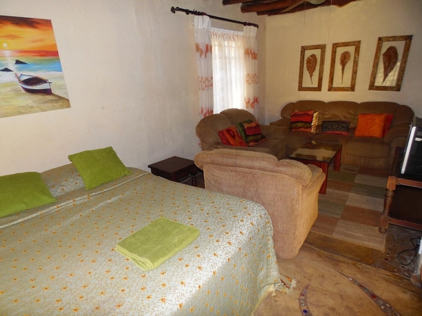 Imagen de la habitación del Hotel Hazyview Country Cottages. Foto 6