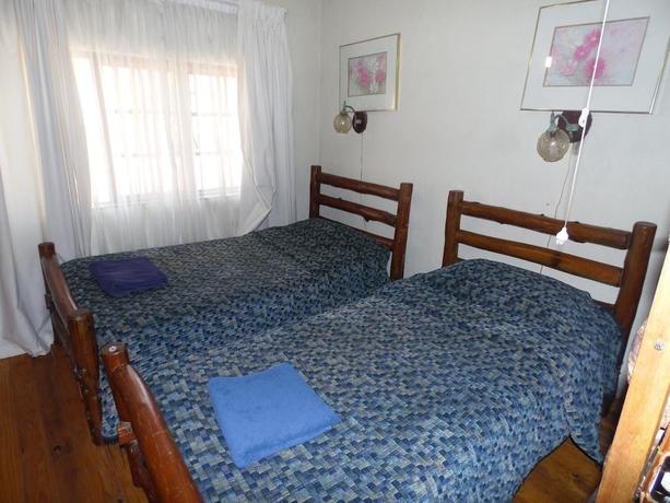 Imagen de la habitación del Hotel Hazyview Country Cottages. Foto 11