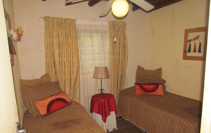Imagen de la habitación del Hotel Hazyview Country Cottages. Foto 15