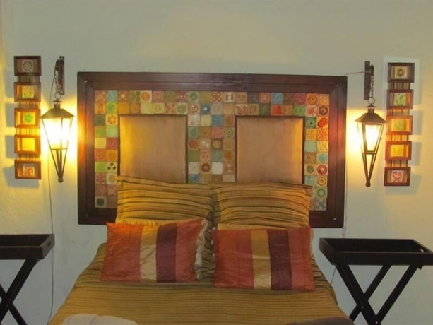 Imagen de la habitación del Hotel Hazyview Country Cottages. Foto 16