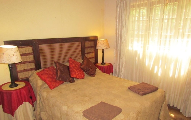 Imagen de la habitación del Hotel Hazyview Country Cottages. Foto 17