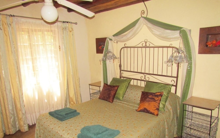 Imagen de la habitación del Hotel Hazyview Country Cottages. Foto 18