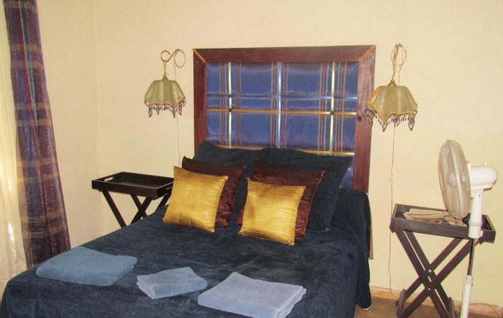 Imagen de la habitación del Hotel Hazyview Country Cottages. Foto 19