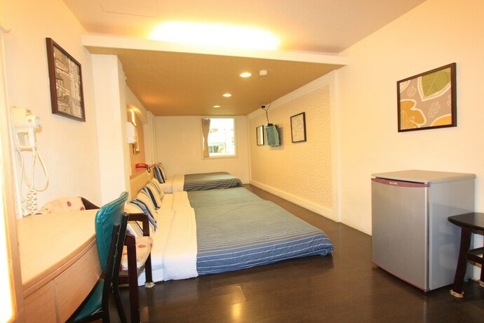 Imagen de la habitación del Hotel Hc Inn. Foto 26