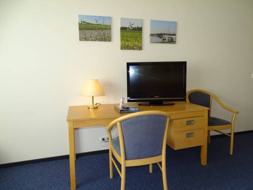 Imagen de la habitación del Hotel Hcr De Kroon. Foto 3