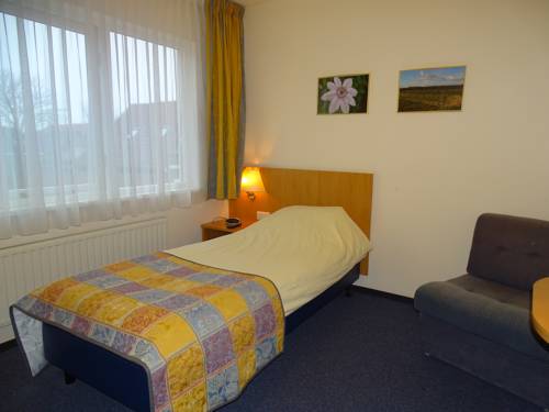 Imagen de la habitación del Hotel Hcr De Kroon. Foto 11