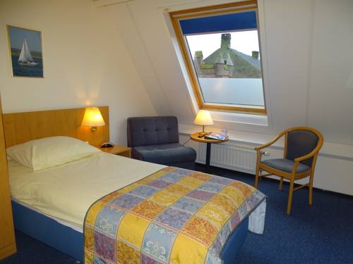 Imagen de la habitación del Hotel Hcr De Kroon. Foto 16