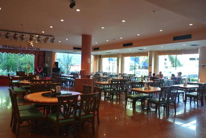 Imagen del bar/restaurante del Hotel He Jia Grand Hotel. Foto 3