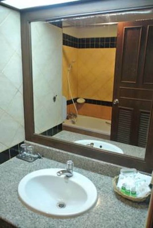 Imagen de la habitación del Hotel He Jia Grand Hotel. Foto 15