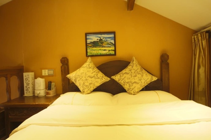 Imagen de la habitación del Hotel He Mu Ju Inn Zhongyi Branch. Foto 4