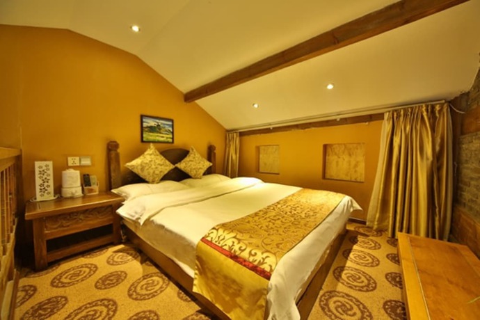 Imagen de la habitación del Hotel He Mu Ju Inn Zhongyi Branch. Foto 8