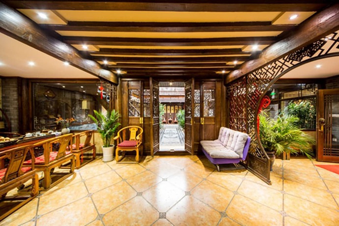 Imagen de los interiores del Hotel He Mu Ju Inn Zhongyi Branch. Foto 19