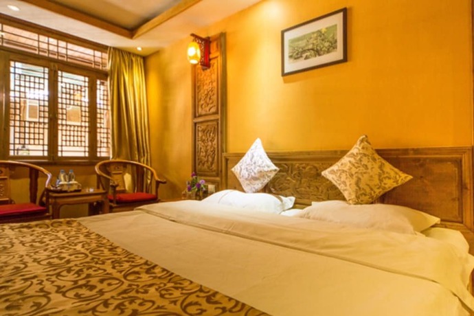 Imagen de la habitación del Hotel He Mu Ju Inn Zhongyi Branch. Foto 11