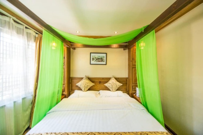 Imagen de la habitación del Hotel He Mu Ju Inn Zhongyi Branch. Foto 18