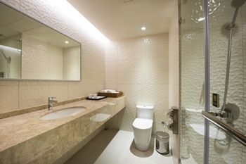 Imagen de la habitación del Hotel He Ti. Foto 7