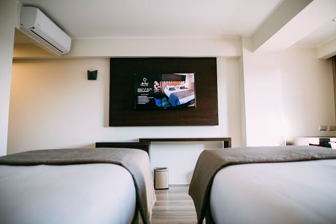 Imagen de la habitación del Hotel He Wang. Foto 17