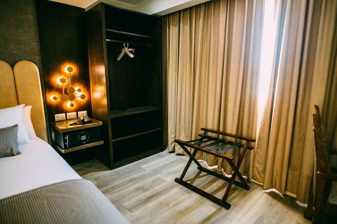 Imagen de la habitación del Hotel He Wang. Foto 18