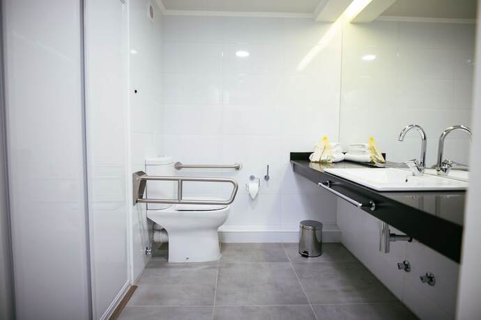 Imagen de la habitación del Hotel He Wang. Foto 19