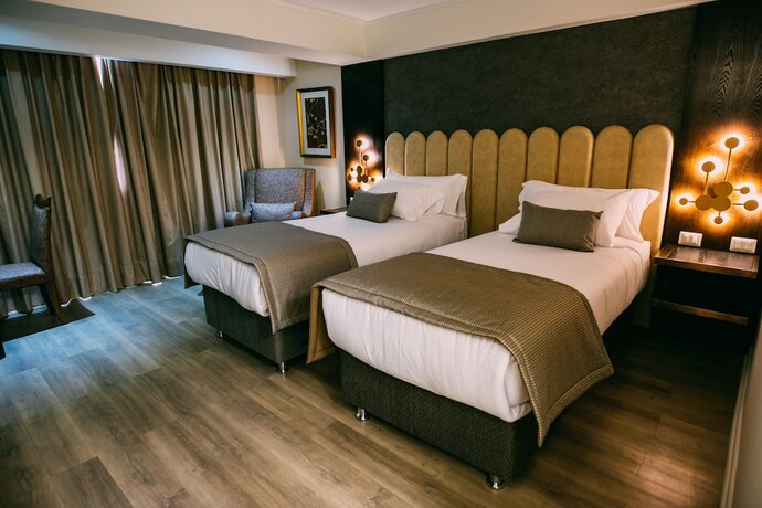 Imagen de la habitación del Hotel He Wang. Foto 20