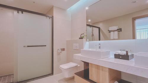 Imagen de la habitación del Hotel He of Banma Resorts. Foto 17