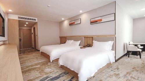 Imagen de la habitación del Hotel He of Banma Resorts. Foto 19