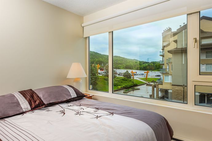 Imagen de la habitación del Hotel H&eacute;bergement Mont-sainte-anne. Foto 2