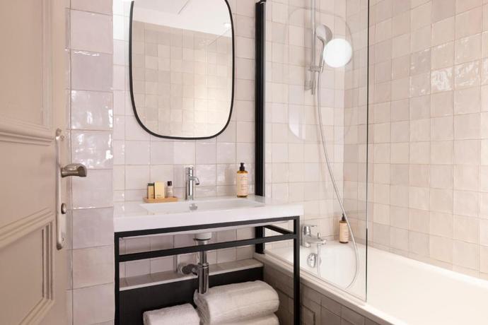 Imagen de la habitación del Hotel H&eacute;lios Op&eacute;ra. Foto 11