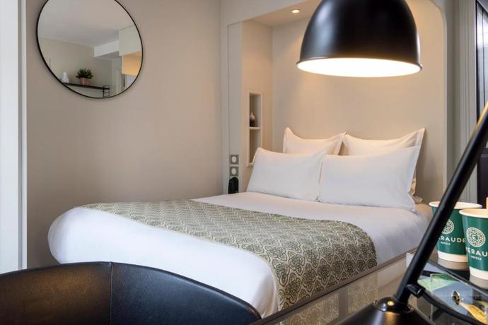 Imagen de la habitación del Hotel H&eacute;lios Op&eacute;ra. Foto 15
