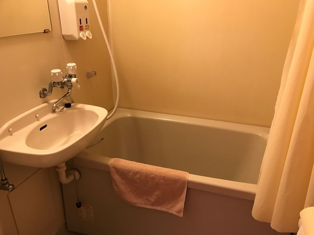 Imagen de la habitación del Hotel Heal In Yokkaichi. Foto 4