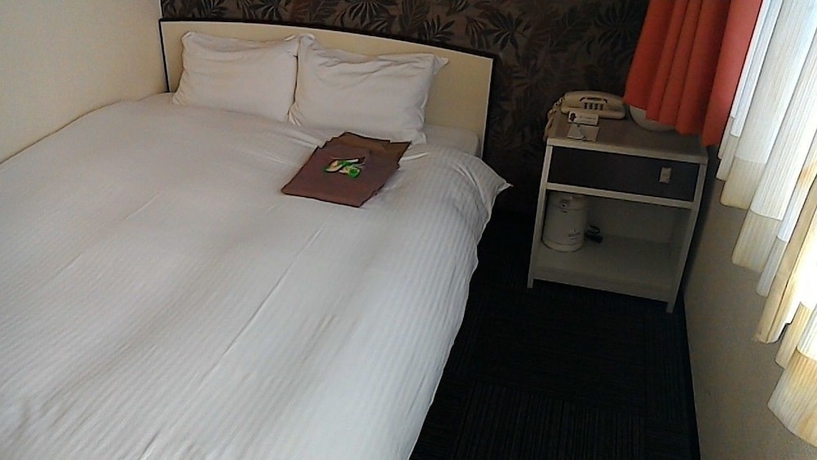 Imagen de la habitación del Hotel Heal In Yokkaichi. Foto 12