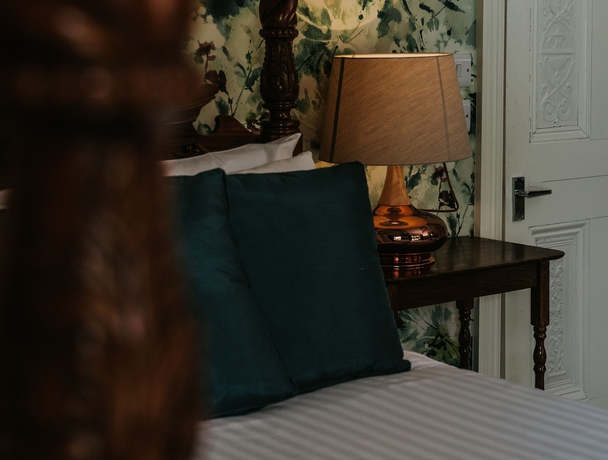 Imagen de la habitación del Hotel Healing Manor. Foto 19