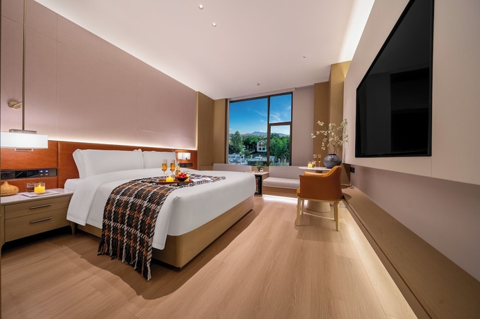 Imagen de la habitación del Hotel Healing Mind International Kunming Dianchi Grand View Park Fuhai Metro Station Branch. Foto 2