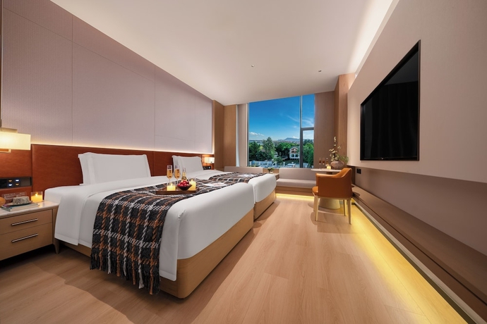 Imagen de la habitación del Hotel Healing Mind International Kunming Dianchi Grand View Park Fuhai Metro Station Branch. Foto 10