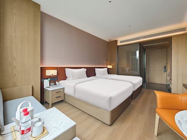 Imagen de la habitación del Hotel Healing Mind International Kunming Dianchi Grand View Park Fuhai Metro Station Branch. Foto 11