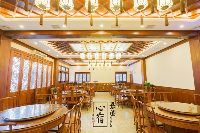 Imagen del bar/restaurante del Hotel Heart Retreat. Xiyuan. Foto 2