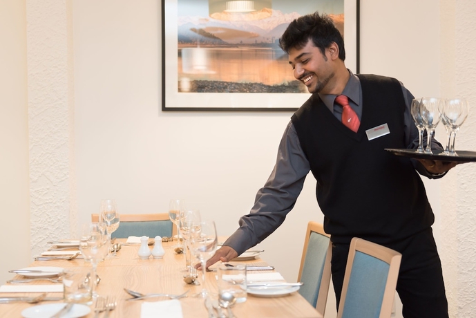 Imagen del bar/restaurante del Hotel Heartland Glacier Country. Foto 3