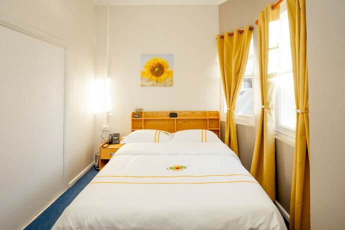 Imagen de la habitación del Hotel Hearty Center. Foto 12