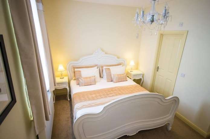 Imagen de la habitación del Hotel Heath Cottage. Foto 7