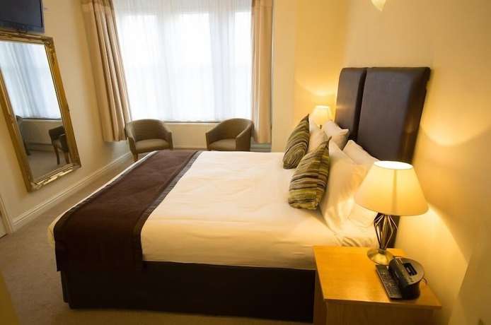 Imagen de la habitación del Hotel Heath Cottage. Foto 14