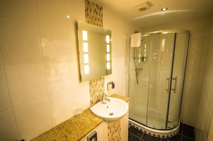 Imagen de la habitación del Hotel Heath Cottage. Foto 19