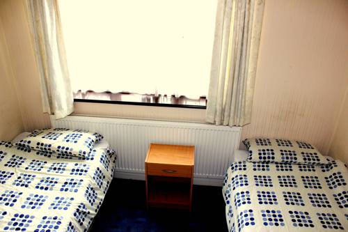 Imagen de la habitación del Hotel Heathrow Lodge. Foto 8