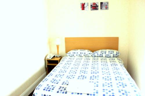 Imagen de la habitación del Hotel Heathrow Lodge. Foto 13