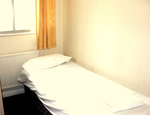 Imagen de la habitación del Hotel Heathrow Lodge. Foto 14