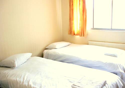 Imagen de la habitación del Hotel Heathrow Lodge. Foto 16