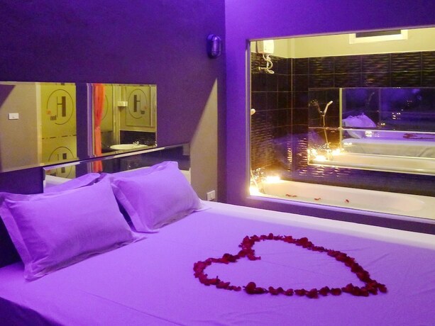 Imagen de la habitación del Hotel Heaven Inn. Foto 16