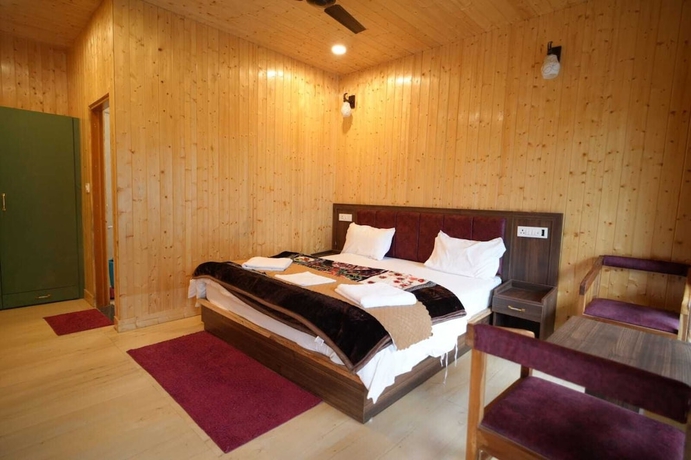 Imagen de la habitación del Hotel Heaven Resorts. Foto 6