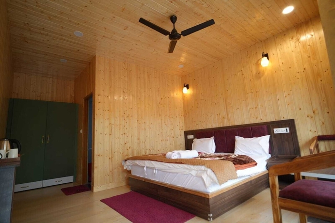 Imagen de la habitación del Hotel Heaven Resorts. Foto 7