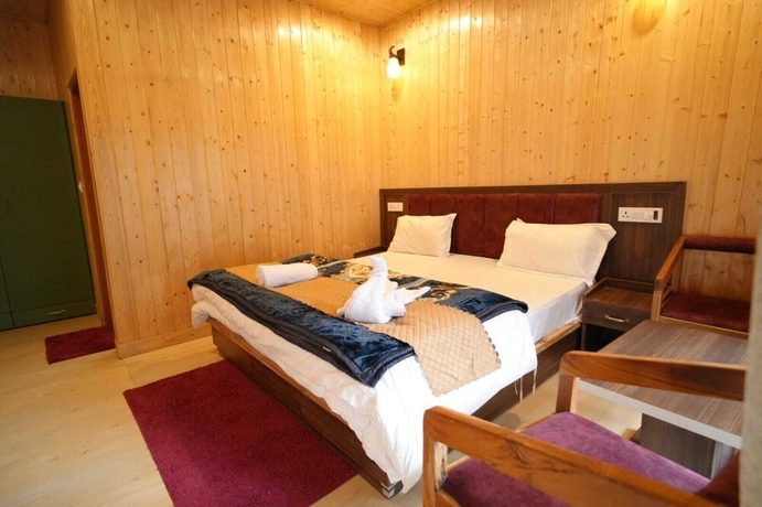 Imagen de la habitación del Hotel Heaven Resorts. Foto 9